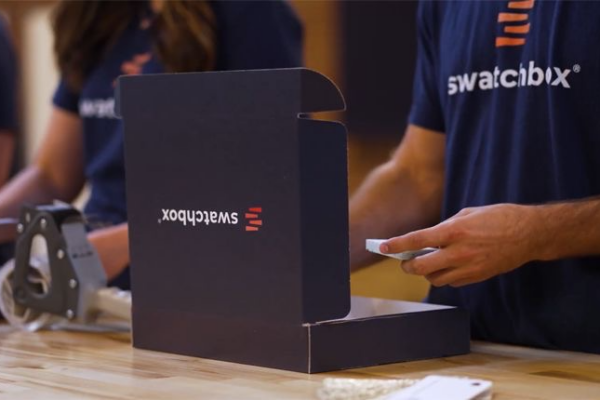 Durasein sample being packaged by Swatchbox sampling fulfillment team